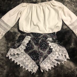Off the shoulder top with match shorts.